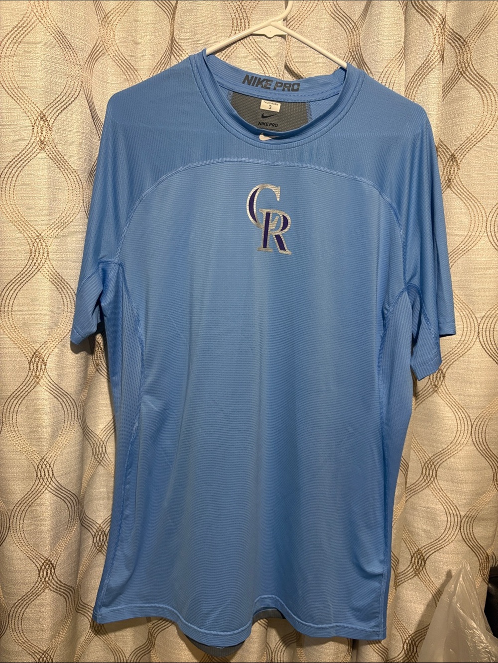 Nike Men’s Light Blue Colorado Rockies Logo Performance Tee